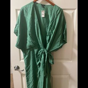 Ann Taylor size 18 deep chest wrap dress. The fabric is very thin and soft.